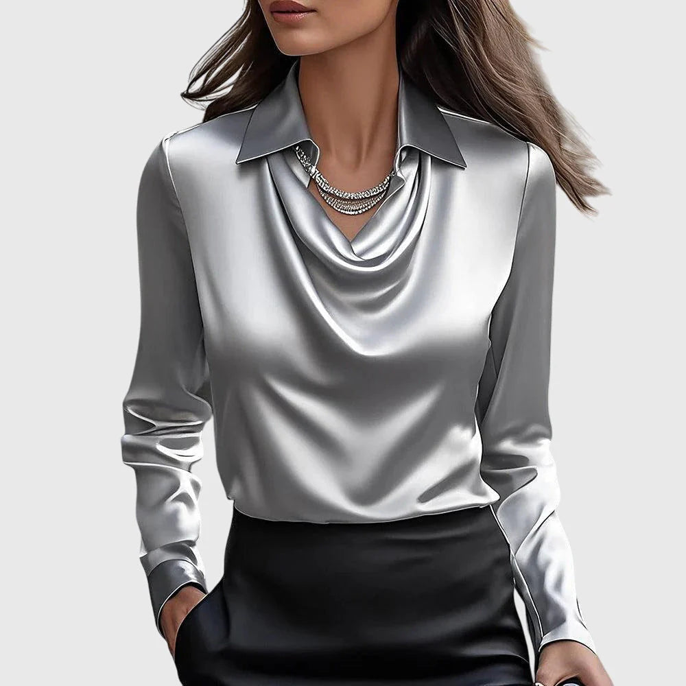 Blouse au brillant luxueux avec col plissé