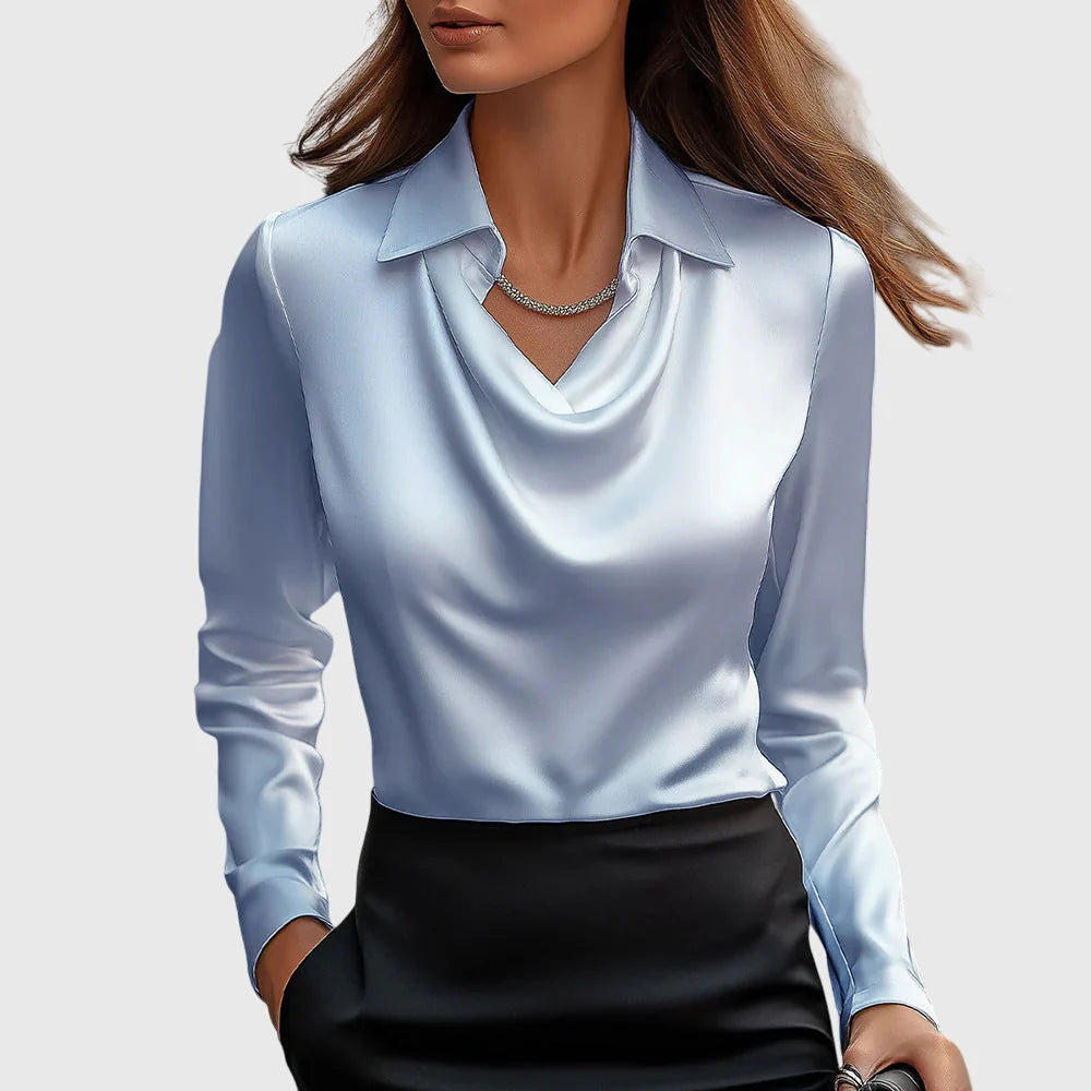 Blouse au brillant luxueux avec col plissé